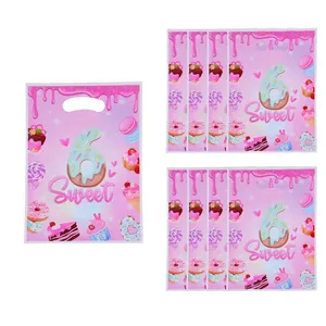 Pink pearlescent film gift bags with sweet donut design for 6th birthday party packs