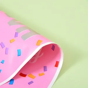 Pink pearlescent birthday party gift bag with colorful confetti sprinkle print