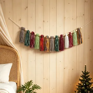Handmade boho tassel banner with wooden beads for cozy Christmas home wall decoration