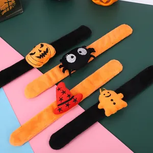 Assorted Halloween plush slap bracelets with pumpkin, spider, and ghost party designs