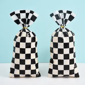 Pair of black and white checkered OPP plastic bags for cookie and candy packaging