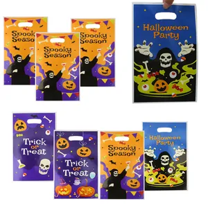 Assorted Halloween party plastic gift bags featuring pumpkin and skeleton prints