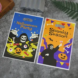 Set of Halloween themed plastic gift bags featuring spooky pumpkin and skeleton designs