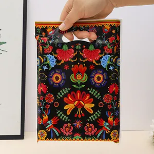 Ethnic style floral plastic gift bag 18x25cm featuring vibrant folk art bird pattern