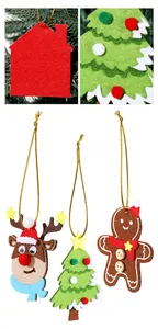 Detail view of handmade felt Christmas ornaments featuring reindeer and gingerbread man.