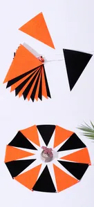 Close-up of orange and black non-woven felt triangle bunting for Halloween party decor.