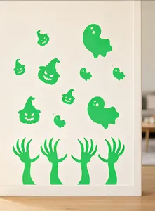 Stickers muraux Halloween vert fluo avec motifs de fantômes et de griffes effrayantes.