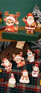 Collection of cute cartoon Christmas wooden table ornaments featuring various holiday characters