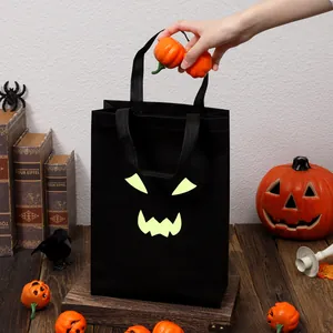 Bolsa de regalo de Halloween con cara de fantasma luminosa para niños y fiestas