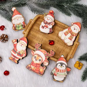 Festive Christmas cartoon wooden ornaments featuring Santa, reindeer, and penguin characters.
