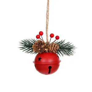 Festive red Christmas bell ornament decorated with pine cones needles and red berries