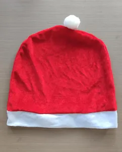 Detail view of a soft red Santa hat chair back cover for Christmas festive decor.
