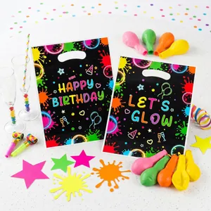 Neon paint splash birthday gift bags featuring vibrant glow party theme and star designs