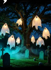 Atmospheric Halloween scene with glowing LED ghost lights hanging on a spooky tree