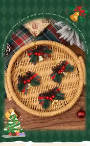 Detail view of festive Christmas bell ornaments with pine cones on a rattan tray