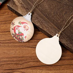 Vintage flat wooden Christmas ornaments featuring a retro Santa Claus print on twine