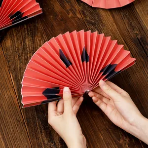 Red and black Halloween paper fan decoration for festive party and home decoration