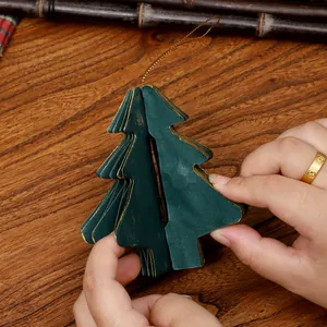 Decorazione natalizia a nido d'ape in carta verde con cordino dorato da spiegare