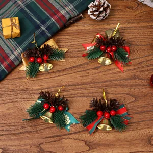 Festive Christmas bell ornaments with pine cones and bows on a rustic wooden table