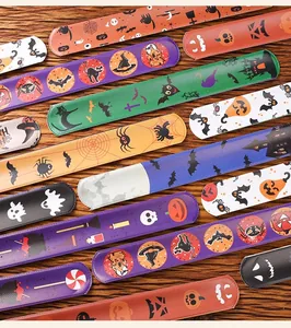 Assortiment Halloween slap bracelets met pompoen- en vleermuispatronen voor themafeesten