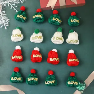 Mini festive knitted Christmas hats with LOVE lettering for lollipop and holiday decor