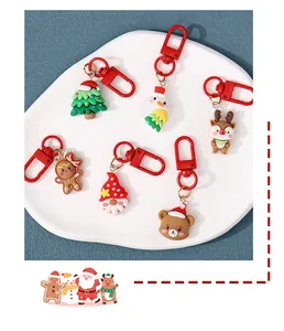 Collection of cute Christmas resin keychains featuring tree, snowman, and bear designs.