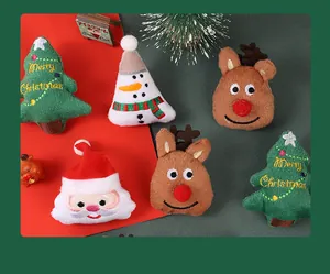 Set of festive plush Christmas brooches featuring Santa, reindeer, and trees