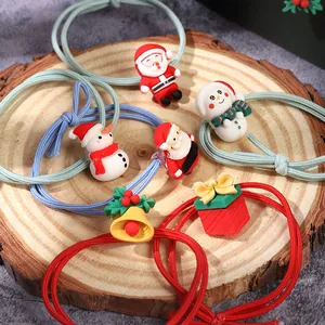 Festive Christmas elastic hair ties set with cute cartoon Santa and snowman charms.
