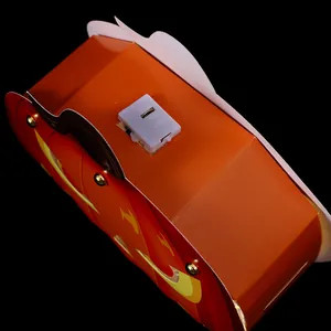 Macro view of the power switch and battery box for DIY Halloween pumpkin lantern
