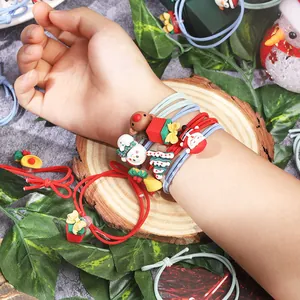 Cute cartoon Christmas hair elastic bands set featuring festive charms for girls