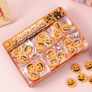 Juego de gomas de borrar calabaza Halloween con expresiones lindas en caja naranja.