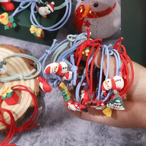Festive Christmas hair elastic ties with cute snowman and tree charms in red and blue