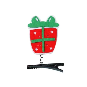 Festive Christmas felt gift box hair clip with spring bobble mechanism for children holiday wear