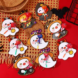 Decorative Halloween lollipop paper cards featuring cartoon ghost and pumpkin designs for parties