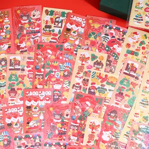 Autocollants de Noël laser colorés pour enfants avec personnages et motifs festifs.