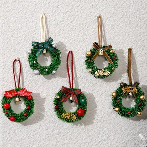 Mini Christmas wreaths with bells and bows for tree or car decoration