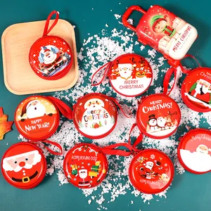 Collection de divers mini porte-monnaies de Noël avec des motifs festifs de Père Noël