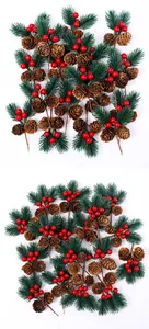 Detailed view of artificial pine needles with red berries and brown pine cones for DIY