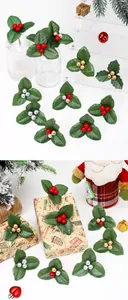 Detailed view of mini Christmas holly leaf picks with red, gold and silver berries.
