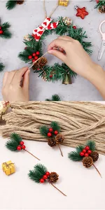 Close-up of DIY Christmas wreath accessories with pine needles, berries and cones