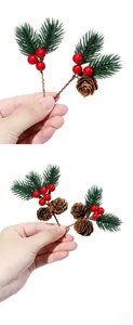 Detail view of artificial pine needles with red berries and pine cones for Christmas DIY decor