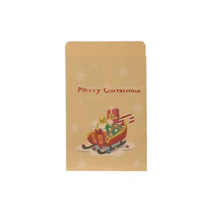 Festlicher Briefumschlag aus Kraftpapier zu Weihnachten mit Schlitten-Illustration