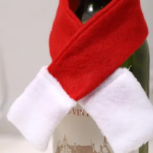 Detail of red and white non-woven mini scarf for Christmas wine bottle decoration