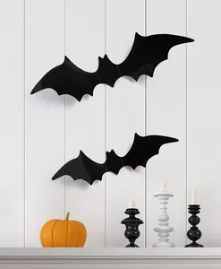 3D zwarte vleermuis muurstickers in een minimalistische Halloween decoratie