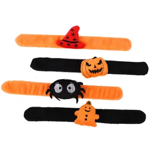 Plush Halloween slap bracelets with pumpkin, spider, witch hat, and ghost designs.