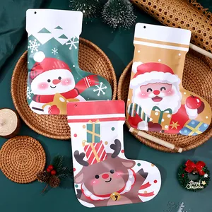Festive Christmas stocking candy bags featuring Santa, Snowman and Reindeer cartoon designs