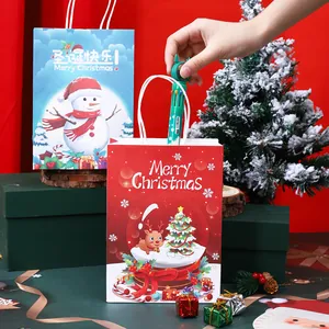 Bolsas de regalo de Navidad de papel con diseños de muñeco de nieve y renos con asas