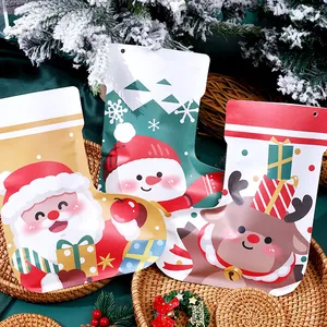 Decorative Christmas stocking candy gift bags with Santa, Snowman, and Reindeer motifs