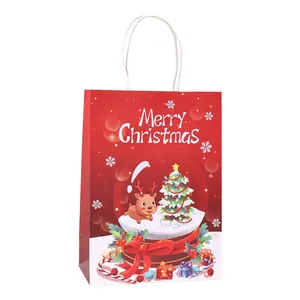 Bolsa de regalo de Navidad roja festiva de papel con diseño de bola de nieve de reno