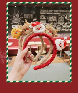 Detailed view of soft plush Christmas headbands featuring Santa Claus and reindeer